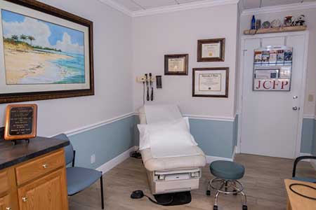 An examination room in the practice.